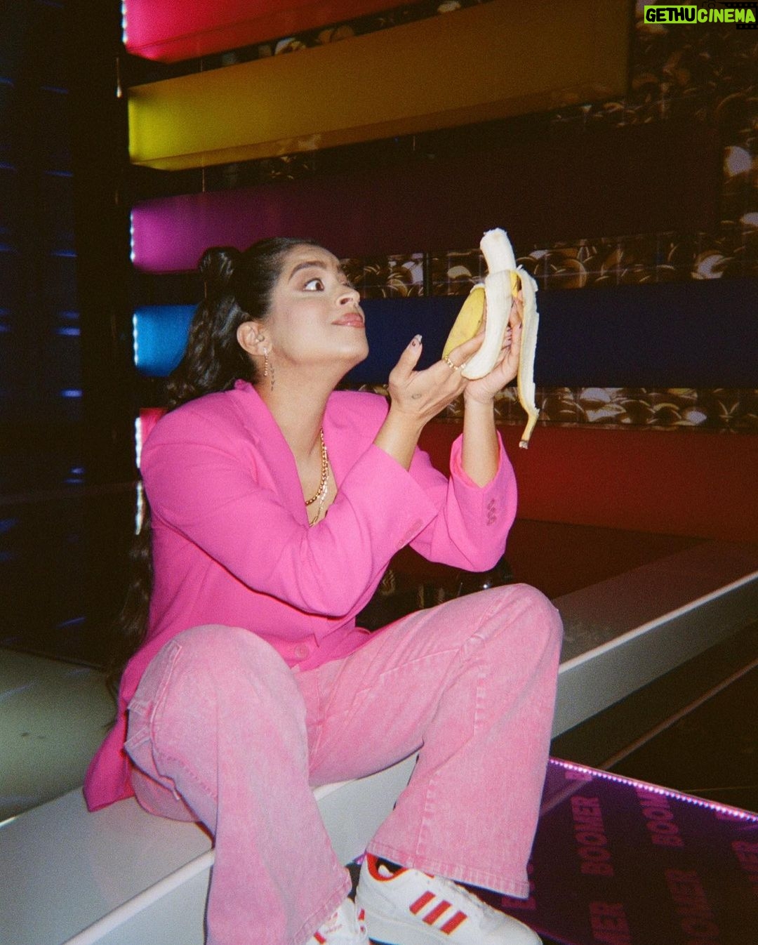 Lilly Singh Instagram - Everyday I eat a banana at 1pm to break my fast. Iām usually working at 1pm so I decided to embrace it and make it art. *cue Hollaback girl* IYKYK š