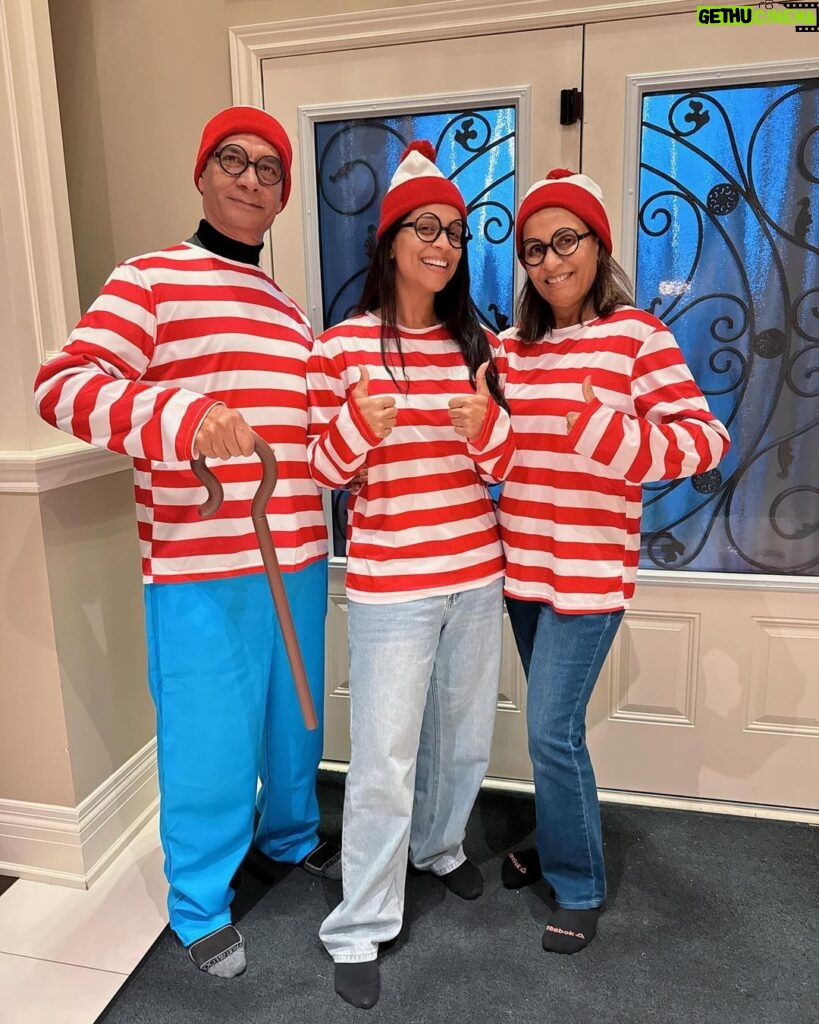 Lilly Singh Instagram - My mom’s favourite activity is playing Where’s Waldo. Naturally I had to get us these matching Halloween costumes. I feel like the older I get, the more I want to give my parents opportunities to act like children and have fun. They spent most of their life being responsible, so today… we eat candy and dance to the Monster Mash 🫡