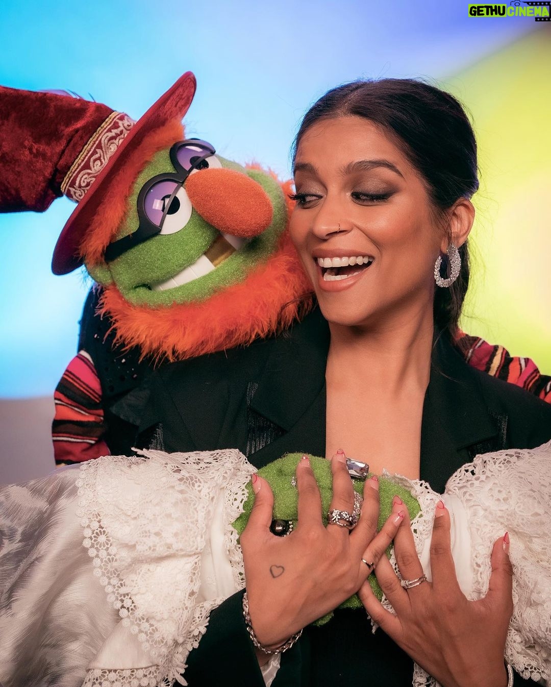 Lilly Singh Instagram - Family portrait ❤️ I. AM. FREAKING. OUT. The Muppets Mayhem starts streaming TOMORROW, May 10th, internationally on Disney+! I can’t wait for you to meet Nora Singh and go on this joyride with us. Set your alarm. Invite your friends over. Tell your Nani to nap accordingly. And let boo know this is the date night plan! I can’t believe we’re just hours away… 🙏🏽 @themuppetsmayhem @electricmayhemband