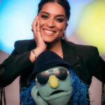 Lilly Singh Instagram - Family portrait ❤️ I. AM. FREAKING. OUT. The Muppets Mayhem starts streaming TOMORROW, May 10th, internationally on Disney+! I can’t wait for you to meet Nora Singh and go on this joyride with us. Set your alarm. Invite your friends over. Tell your Nani to nap accordingly. And let boo know this is the date night plan! I can’t believe we’re just hours away… 🙏🏽 @themuppetsmayhem @electricmayhemband
