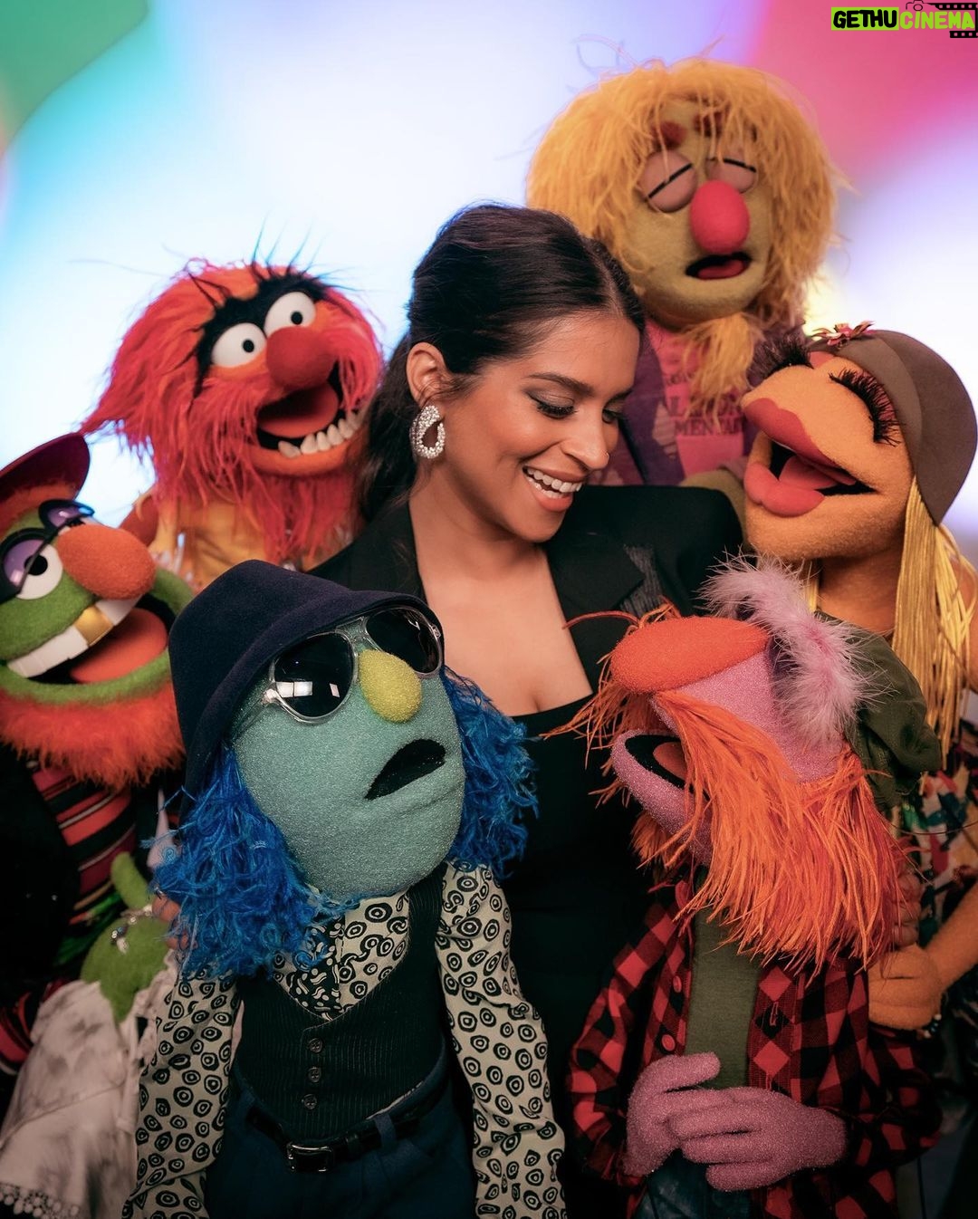 Lilly Singh Instagram - Family portrait ❤️ I. AM. FREAKING. OUT. The Muppets Mayhem starts streaming TOMORROW, May 10th, internationally on Disney+! I can’t wait for you to meet Nora Singh and go on this joyride with us. Set your alarm. Invite your friends over. Tell your Nani to nap accordingly. And let boo know this is the date night plan! I can’t believe we’re just hours away… 🙏🏽 @themuppetsmayhem @electricmayhemband