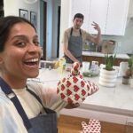 Lilly Singh Instagram - I have an album of photos on my phone that capture a silly or heart-warming memory that I love to re-live again and again. Just me? 1. this is from my recent trip to India. I was visiting a girls school and this student just spent 5 whole minutes explaining her science project to me. I nodded and pretended I knew the scientific words she was saying. When she was done, I looked up and this was my genuine reaction, perfectly captured. Don’t sleep on the potential of Indian girls 💪🏽 2. Live coverage of my mom calling local bookstores to find @lillyslibrarys latest select 🥹 please don’t miss her little notepad. 3. A couple weeks ago, my friend and I cooked dinner for our group chat. We planned for a week, played Italian music while cooking and had the most zen time… until we didn’t, and there was 30 mins left and dinner was more than an hour late 👀 4. From the same dinner, I let my friends take leftovers home in my Tupperware. I do not play when it comes to my Tupperware. My friend left his watch at my house and I texted him this picture saying “I’m glad I have this. You’ll get it back when you return my Tupperware.” I was not joking. 5. A candid shot of my best friend aka my dog watching me during a recent photoshoot. 6. Another gem from India, where this group of girls and I just had an hour convo discussing all the challenges they face. And then we took this picture and I dunno, their smiles really make something in my heart flicker, especially the one next to me. 7. Me at a recent CGT taping with a friend from high school I haven’t seen over a decade. She DMed me saying her kids are fans and I invited her family to come. She was always so extremely nice to me in high school, even if it wasn’t the cool thing to do. 💜 The majority of pics on my phone, I never look at again. But there are some that are just 🤌🏽