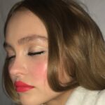 Lily-Rose Depp Instagram – Lip blush bts @luciapicaofficial looks 🤤