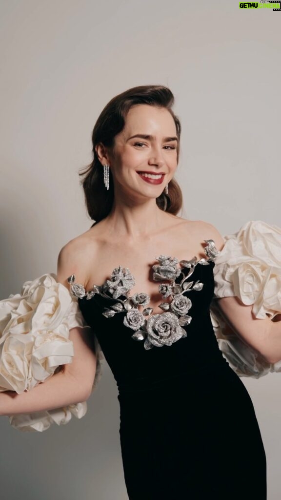 Lily Collins Instagram - During a break from filming the upcoming season of #EmilyInParis in the French capital, @LilyJCollins made a return to the red carpet at the 2024 #BAFTAs – and she invited @BritishVogue along to get ready with her. Watch to see how she prepared for the event – and click the link in bio to read all her beauty secrets. Filmed by @NishaJohny and styled by @RobZangardi and @MarielHaenn, with hair by @KenORourke1 and make-up by @LisaEldridgeMakeup with @LancomeOfficial.