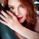 Lindsay Lohan Instagram - Cosmo Photoshoot 💚 Outfit 1: Anthony Vaccarello dress, Albright Fashion Library. Outfit 2: Anthony Vaccarello dress, Albright Fashion Library. Chopard ring (left). Lindsay's own ring (right). Outfit 3: Christian Siriano jacket and skirt. Ara Vartanian earrings and two-finger ring. Sauer ring. Outfit 4: Alexandre Vauthier dress. Sauer ring. Outfit 5: Alexandre Vauthier dress and boots. Carolina Neves earrings. Sauer ring. Outfit 6: Adriana Degreas dress. SKIMS bandeau. Chantelle briefs. Piferi sandals. Sauer earrings. Chopard ring. Outfit 7: Alexandre Vauthier dress and boots. Celine sunglasses. Carolina Neves earrings. Sportmax gloves. Sauer ring. Outfit 8: Chanel jumpsuit, New York Vintage. Roger Vivier heels. Tiffany & Co. necklace. Melissa Kaye ring. Outfit 9: Valentino dress, New York Vintage. Giuseppe Zanotti sandals. Ara Vartanian earrings and two-finger ring. Chopard ring.