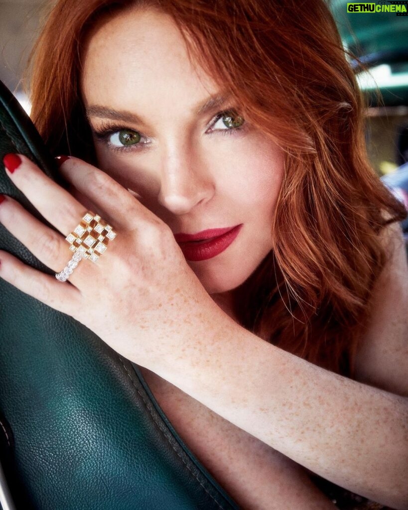 Lindsay Lohan Instagram - Cosmo Photoshoot 💚 Outfit 1: Anthony Vaccarello dress, Albright Fashion Library. Outfit 2: Anthony Vaccarello dress, Albright Fashion Library. Chopard ring (left). Lindsay's own ring (right). Outfit 3: Christian Siriano jacket and skirt. Ara Vartanian earrings and two-finger ring. Sauer ring. Outfit 4: Alexandre Vauthier dress. Sauer ring. Outfit 5: Alexandre Vauthier dress and boots. Carolina Neves earrings. Sauer ring. Outfit 6: Adriana Degreas dress. SKIMS bandeau. Chantelle briefs. Piferi sandals. Sauer earrings. Chopard ring. Outfit 7: Alexandre Vauthier dress and boots. Celine sunglasses. Carolina Neves earrings. Sportmax gloves. Sauer ring. Outfit 8: Chanel jumpsuit, New York Vintage. Roger Vivier heels. Tiffany & Co. necklace. Melissa Kaye ring. Outfit 9: Valentino dress, New York Vintage. Giuseppe Zanotti sandals. Ara Vartanian earrings and two-finger ring. Chopard ring.