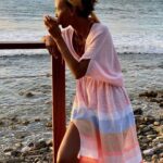 Liya Kebede Instagram - Sunset & cappuccino time 🌅 ☕️ in @lemlemofficial Marjani plunge dress #lemlem