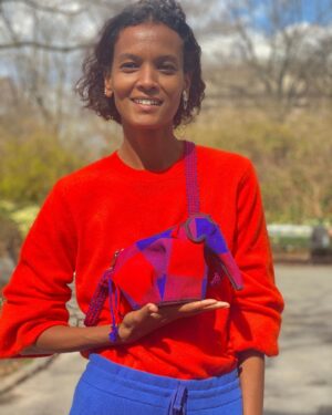 Liya Kebede Instagram - @loewe mini Elephant bag matching my outfit 😂 ❤️❤️details made by women from the Samburu Workshop in Northern Kenya- collaboration with #KnotOnMyPlanet to help secure a future for elephants and raise money for the @ElephantCrisisFund  #loewekomp #elephantcrisisfund #loewe