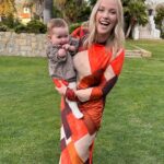 Liz Trinnear Instagram - 6 months in vs. 6 months out. . We went to a beautiful wedding in Santa Barbara this weekend. I decided to change my outfit last minute, not realizing that the last time I wore this dress I was in Santa Barbara, pregnant with Nico … The first video is from February 2023 and the second is from December 2023. I loved being pregnant with her, dreaming about what she would look like, sound like, smell like. Now that she’s here she’s just the most joyful, happy, shining ray of sunshine, brightening up every room she walks into ☀️Moments like this remind me of how far we’ve come in our journey to have her. This is your reminder to not give up on whatever that dream may be. It will be worth the wait 🌈 Santa Barbara, California