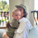 Liz Trinnear Instagram - Nico’s first plane ride & trip to California ☀️💕🥹 . 1. Pre plane ride pep talk 2. Snackin’ on the plane with dad 3. Uncle David came to pick us up! 4. Cuddles with Uncle Davie 5. One for caffeine, one for “we did it!” 6. Uncle Sean! 7 & 8. Daddy time 💕 9. Hanging with bestie Auggie Los Angeles, California