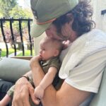 Liz Trinnear Instagram - Nico’s first plane ride & trip to California ☀️💕🥹 . 1. Pre plane ride pep talk 2. Snackin’ on the plane with dad 3. Uncle David came to pick us up! 4. Cuddles with Uncle Davie 5. One for caffeine, one for “we did it!” 6. Uncle Sean! 7 & 8. Daddy time 💕 9. Hanging with bestie Auggie Los Angeles, California