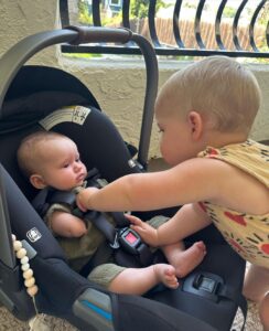 Liz Trinnear Instagram - Nico’s first plane ride & trip to California ☀️💕🥹 . 1. Pre plane ride pep talk 2. Snackin’ on the plane with dad 3. Uncle David came to pick us up! 4. Cuddles with Uncle Davie 5. One for caffeine, one for “we did it!” 6. Uncle Sean! 7 & 8. Daddy time 💕 9. Hanging with bestie Auggie Los Angeles, California
