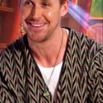 Liz Trinnear Instagram - First time interviewing THE Ryan 🇨🇦 Gosling… had to bring him some goods from the motherland 💕 #ryangosling #thegrayman . . Full interview on YouTube.com/etalkctv Shoutout to @fiveonenineclothing for helping out! Cc: @netflixca Los Angeles, California