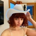Lola Blanc Instagram - It is I, the wearer of many hats. Thank you so much to everyone who’s covered @pruningfilm so far. It’s been an honor being able to discuss this film we worked so hard on - full credits in my film fest announcement posts. If you want to see Pruning in person, it’s screening in LA this Sunday at @hollyshorts! Tickets on sale now in my bio, and new festival announcements in different cities/countries coming soon. Also, @trustmepodcast fans and horror fans, come see Karyn Kusama’s The Invitation on August 30th at @am_cinematheque! Your girls @meaganelizabethgrainger and I will be introducing it. Also listen to my new song and add it to playlists because a girl with this much headwear has got to be shameless ✨