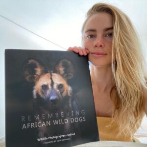 Lucy Fry Instagram - It’s remembering wildlife day. Buying this beautiful photography book from @rememberingwildlife protects these doggos from further habitat loss. My buddy Chio would last a whole 20 mins in the wild... so let’s protect the home of these ballers keeping real out there!