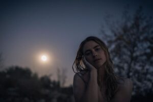 Lucy Fry Instagram - Every woman has a story of resilience. Like the moon, who travels through darkness to become full again.