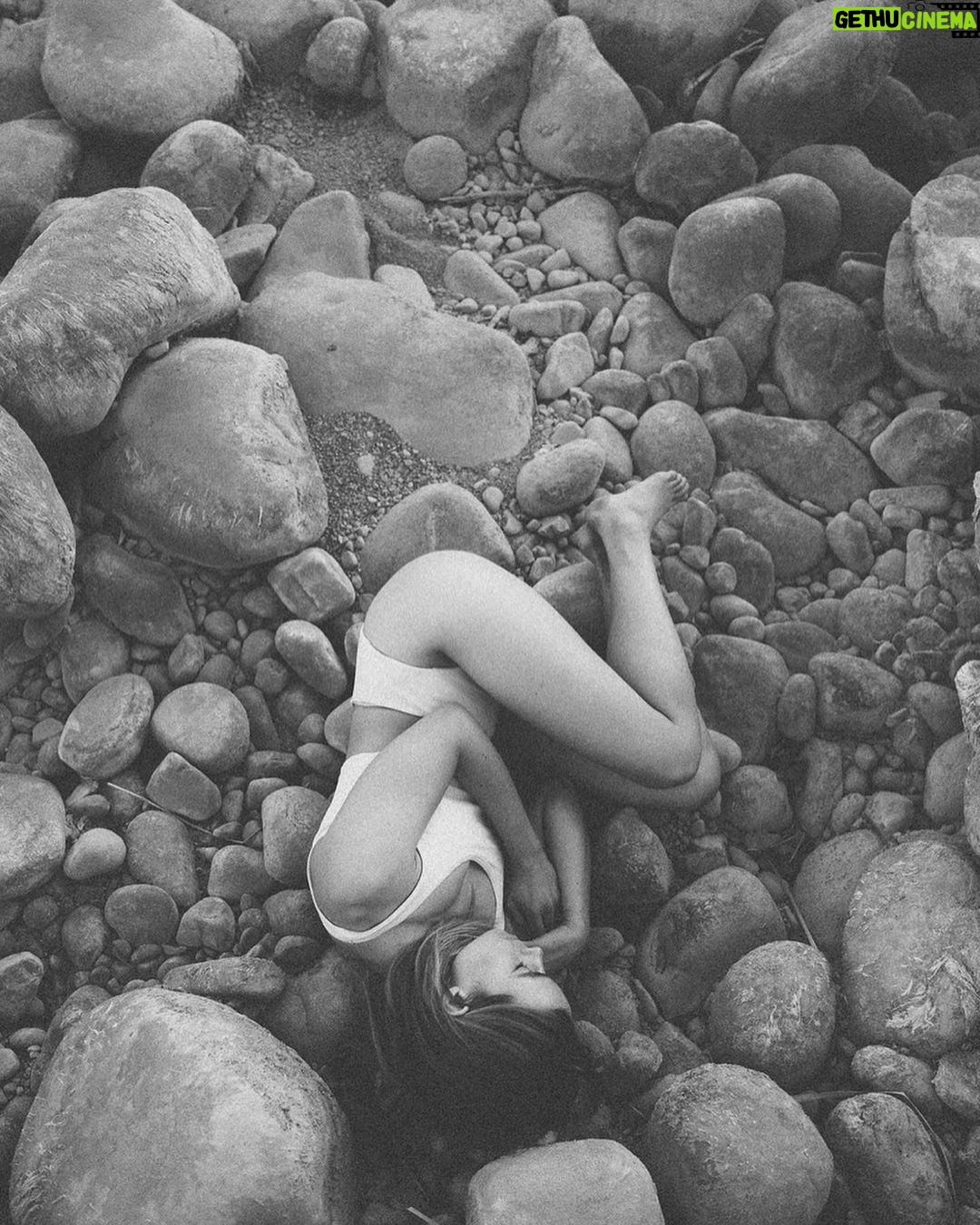 Lucy Fry Instagram - A boulder rolls uphill Exhaustion as the nerves Grind against gravity Rounded shards of sand A worn sea shell She curls into the moon Earth