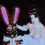 Lucy Loone Instagram - thanks so much to everybody who has watched and even said kind words about the eat it up music video 💛 here’s some flicks of me and chocolate bunny who was the best co-star on set 🤓🎂 ~ 🍫🐰 by @alfredospookyart & 👗👗 by @eddysonline & 🎀 hair by @neciashairstyling ❣️