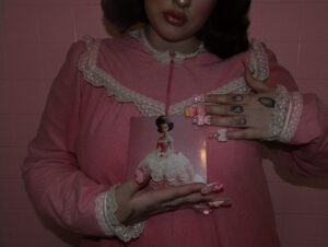 Lucy Loone Instagram - me and my baby. she’s just a little over three months. ain’t she gorgeous? her name is Eat it Up 💝 🥄 as promised, new batch of signed CDs available on @whippedblood now!!!!🩰💗 love you guys & hope you’ve been enjoying the album. thank you a million for the support and welcoming my baby into the world. she’s gonna do great things. xx