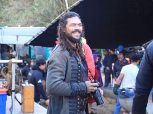 Luke Arnold Instagram - ##WhereIWrote Part 3!
TEN YEARS LATER - after forgetting about my own writing and focusing on other people’s worlds for a while, I found myself in Cape Town pretending to be a pirate. In 2014, I sat down and smashed out a short story about a Man for Hire looking for a missing Vampire teacher. This was the first version that bears any resemblance to the final book. The first person to read it was with incredible @jparkerk3 who gave me enough positive feedback for me to keep tinkering with it. I had the idea of writing a bunch of short stories about this guy and maybe putting them all together in a book one day. My dear friend @stevenlochran who knows far more about publishing than I do, told me that a book of short stories is rarely an exciting pitch for a publisher and I should think about  turning it into a novel.
Pirate life became overwhelmingly busy again but at the end of Season 4, when I had no more insane monologues to learn or fights to practice or push-ups to do, I took my friend’s advice.
#TheLastSmileInSunderCity

Set photos taken by producer extraordinaire Nina Jack