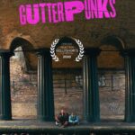 Luke Arnold Instagram - So, I wrote and directed a glitter-filled 90’s girl-power short film called Gutterpunks that’s finally starting its festival run! The amount of talent that came on board this project is just ridiculous. Starring @sophiekennedyclark, @lukemably, introducing Sasha Aston, and with an original song from @kttunstall, this is a very special little story and I’m so glad that you’ll finally be able to see it. We’re screening at @hollyshorts and @woffglasgow, with more to be announced soon! So keep an eye out for a screening near you! ✨🥤🧟‍♀️ 🐐 🎥 📸 @whatsupflo