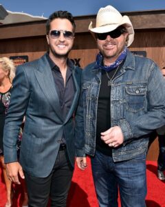 Luke Bryan Instagram - Just arriving at American idol and seeing the sad news in our country community. An iconic artist and a great man. Your songs turn every room into a good time