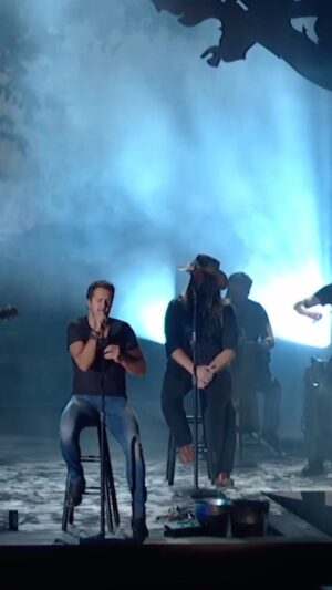 Luke Bryan Instagram - “Drink a Beer” was debuted on the 2013 @CMA Awards alongside @chrisstapleton, who co-wrote the song and is featured on the track. During this performance Luke paid tribute to his late siblings, Kelly and Chris. It’s one of the most special songs to not only Luke and his family but to many of you at his shows as you raise a beer each night to someone you love.