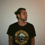 Luke Hemmings Instagram - this man was last seen drinking a freshly brewed almond milk latte or home brewed IPA whilst working on a folk album by the looks of that bun
