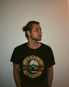 Luke Hemmings Instagram - this man was last seen drinking a freshly brewed almond milk latte or home brewed IPA whilst working on a folk album by the looks of that bun