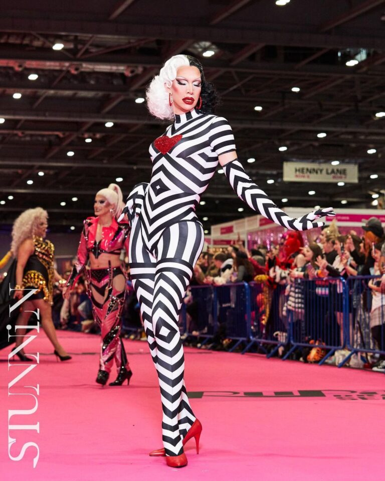 Ma'Ma Queen Instagram - Spreading love on the pink carpet @rupaulsdragcon London 2024! Thank you so much for the beautiful pictures @cyrieljacobs @stunnin.mag Thank you @licka_lolly for this Cruella d’Evil inspired hair! Outfit made by me ♥️ Special thanks to @xtraxceptit and @_macelton_ for being there every step of the way! For all your help, your amazing energy, you love and unconditional support. And ofcourse my love @megan_schoonbrood , bless us for being besties celebrating this beautiful second drag con together. 💖