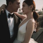 Ma Kwok-Ming Instagram - 一直沒有放婚紗照， 因為想保持一下神秘感給婚禮的來賓， 忍了這麼久，終於可以發了！ 非常感謝 @alden_chenyin 小白老師base在巴黎的團隊， 整個法國婚紗照之旅非常順利， 妝化小姐姐們也非常專業！ 非常喜歡拍出來效果 所以婚禮也決定一定要邀請小白老師， 所有賓客都非常喜歡出來的效果 也特別感謝 @misselvani 的介紹才認識小白老師😚 👰‍♀️ White wedding gown @trinitybridal @ritavinieris 🤵‍♂️ black suit @alexandermcqueen shoes @ysl Beige suit @ralphlauren style director @derekho_ styling @wiling_cc @creativecoven_