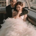 Ma Kwok-Ming Instagram - 一直沒有放婚紗照， 因為想保持一下神秘感給婚禮的來賓， 忍了這麼久，終於可以發了！ 非常感謝 @alden_chenyin 小白老師base在巴黎的團隊， 整個法國婚紗照之旅非常順利， 妝化小姐姐們也非常專業！ 非常喜歡拍出來效果 所以婚禮也決定一定要邀請小白老師， 所有賓客都非常喜歡出來的效果 也特別感謝 @misselvani 的介紹才認識小白老師😚 👰‍♀️ White wedding gown @trinitybridal @ritavinieris 🤵‍♂️ black suit @alexandermcqueen shoes @ysl Beige suit @ralphlauren style director @derekho_ styling @wiling_cc @creativecoven_