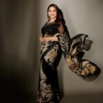 Madhuri Dixit Instagram - Where elegance meets mystery 💫 #friday #fridaynight #panchakpromotions #panchakon5jan #photooftheday #photoshoot