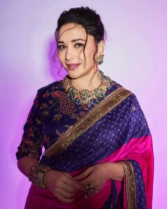 Madhuri Dixit Instagram - A pop of pink, a dash of grace 🫶🏻 #thursday #tbt #photooftheday #photoshoot #dancedeewane #sareelove