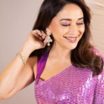 Madhuri Dixit Instagram – “If a kiss could be seen, it would look like a violet” 💜 
– Lucy Maud Montconery

#monday #celebration #photoshoot #photooftheday #violet