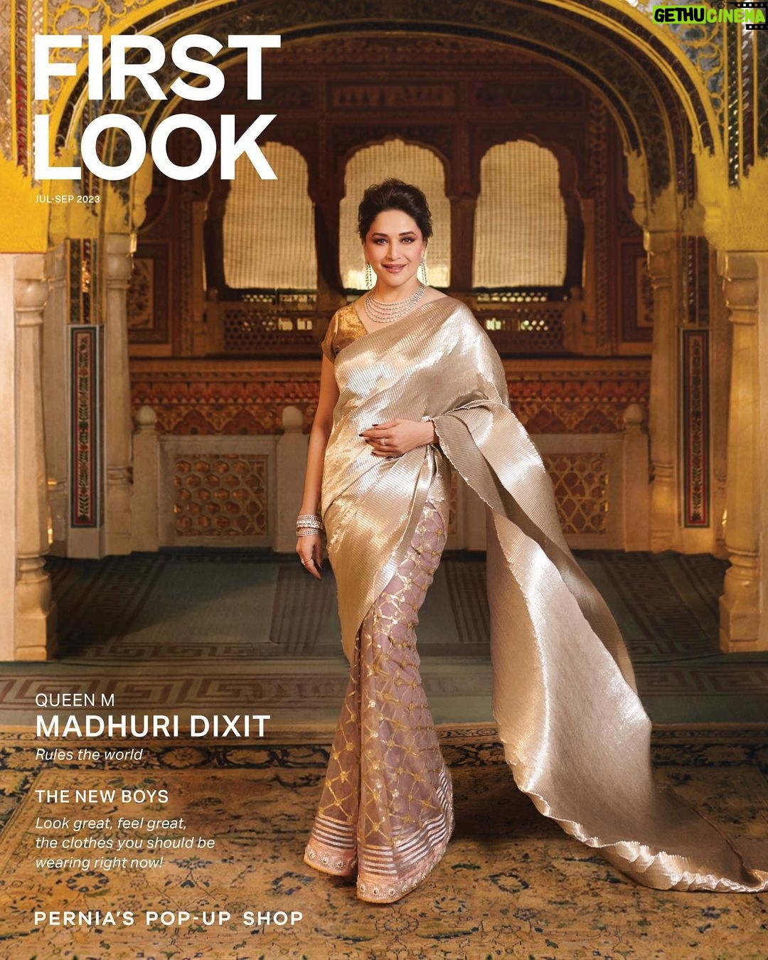 Madhuri Dixit Instagram - Madhuri Dixit: An Icon Of Elegance Embodying the poise and opulence of a Queen, evergreen Bollywood actress Madhuri Dixit @madhuridixitnene graces the cover of First Look @firstlook.magazine by Purple Style Labs, from the house of Pernia’s Pop-Up Shop @perniaspopupshop. . Editor: Nupur Mehta Puri @nupurmehta18 Photographer: Vaishnav Praveen @vaishnavpraveen Creative Director and Stylist: Nupur Mehta Puri @nupurmehta18 @n2root Assistant Stylists: Sanskriti Sharma @sanssgram , Neha Maggo @nehamaggo & Tanya Virdi @tanyavirdi Makeup Artist: Billy Manik @billymanik81 Hair Stylist: Sheetal Khan @sheetal_f_khan Production: Niharika Singh @studiolittledumpling Location: Samode Hotels India @samode_hotels Team Pernia's Pop-Up Shop: Priya Majmudar @priyamajmudar , Revati Palshethkar @revatipalshetkar & Karan Singhania @karansinghania1411 Saree: Kiran Uttam Ghosh ( @kiranuttamghosh ) Jewellery: Aaloki by CH Jewellers ( @aaloki.ch ) . #perniaspopupshop #perniaspopupshopxkiranuttamghosh #kiranuttamghosh #firstlook #firstlookmagazine #magazine #stylefiles #madhuridixit #madhuridixitnene
