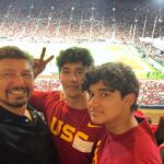 Madhuri Dixit Instagram - Amazing to watch the USC vs Stanford football game as guests of President Folt. The game was action packed and of course USC won 56-10. Fabulous night with amazing people! Many thanks to @President Folt #DeanYannisYortsos #DeanElizabethDaly #DeanEmilyRoxworthy for hosting us. Am grateful to USC for the education the boys will be receiving❤️