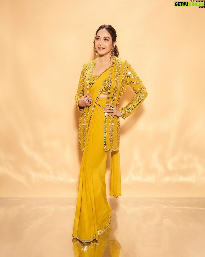 Madhuri Dixit Instagram - Wrapped in sunshine, draped in elegance 💛✨ #yellowelegance #thursday #thursdaythoughts #photooftheday #sareelove #sareestyle