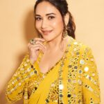 Madhuri Dixit Instagram - Wrapped in sunshine, draped in elegance 💛✨ #yellowelegance #thursday #thursdaythoughts #photooftheday #sareelove #sareestyle