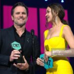 Madison Bailey Instagram - CMT!! What an incredible night. Thank you for having me! I sometimes forget I’m a southern gal but last night I felt right at home 🫶🏽 And to experience this with my momma in law meant the WORLD. I also couldn’t have asked for a better co-presenter @charles_esten Thank you @cmt 💛