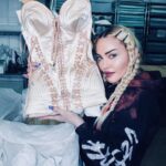 Madonna Instagram - A trip to my archives is always a nostalgic trip down memory lane! If I think about my journey through music over the last 4 decades— how could I not think about all the incredible clothes I got to wear and all the amazing designers I was lucky enough to work with!! When I was a little girl I remember my mother was always cold. Partly because she was sick but also because she never had a coat. She always spent what little money we had on our coats and I remember standing outside waiting for the schoolbus With my mother shivering in the cold in the middle of winter!! Years later when I became successful my mother’s sister said to me, “Now You can buy all the coats your mother couldn’t buy for herself!” The journey from the memory of my shivering mother in Winter to me shivering in the over air-conditioned storage space where all my costumes are stored is quite remarkable! I am overwhelmed with gratitude. Every time I put on an incredible coat I think of my Mother. I hope she likes my taste in costumes But most of all i hope she’s warm! 💗 #madonnacelebrationtour