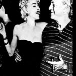 Madonna Instagram – Seymour Stein Has Left Us! I need to catch my breath. 
He  Was  one of the most influential Men in my Life!! He changed and Shaped my world. I must Explain. 

I stalked a DJ  named Mark Kamin- for a year at a club called Danceteria! In the Early 80’s.  He finally agreed to play my demo of a song called “Everybody” on a Saturday night. 
The Club was packed. An A&R man from SIRE records was there—Michael Rosenblatt. 
He heard the music and asked me if he could bring me to meet his boss Seymour Stein. 
I Couldn’t get the words “Hell  Yes”! out of my mouth fast enough! 

Unfortunately Seymour was in the hospital for a  Heart Ailment! 
I didn’t care.  Lets Goooooo!  When I met him he was laying in a hospital bed wearing his boxer shorts and a wife beater! 
He had a cannula up his nose and a saline Drip in his arm!  He was grinning like the Cheshire Cat. 
I was carrying my giant boombox ready to play My cassette for him immediately!  He smiled and laughed when he saw me and asked me if I was related to  the Virgin Mary!! Hahahhahahaa. I knew we would hit it off.  I played  him the song a few times.  He signed me to his record label that day!! 
This moment changed the course of my Life  Forever. And was the beginning of my journey as a Musical Artist.  Not only did Seymour hear me but he Saw me and my Potential!  For this I will  be eternally grateful! 
I am weeping as I write this down.  Words cannot describe how I felt at this moment after years of grinding and being broke and getting every door slammed in my face. 

Anyone who knew Seymour knew about his passion for music and his impeccable taste.  He had an Ear  like no other! 
He was  Intense -Wickedly Funny-a little bit Crazy And Deeply intuitive. 
Dearest Seymour you will never be forgotten!! Thank You! Thank you Thank you! 🙏🏼 💙. . Shine on!!!