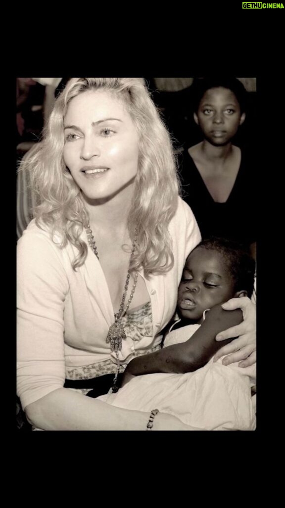 Madonna Instagram - Beautiful Chfifundo James! you’re 18 yrs old today!! Beautiful Mercy James. You’re already a young woman! Beautiful African Queen!! You Surprised all of us! ♥️🇲🇼♥️🇲🇼♥️🇲🇼♥️🇲🇼 You were always the quiet one The gentle one . The Shy and Stoic one. While All of my other children were clamoring for attention, you were Hiding under your hoodie — never wanting to draw attention to yourself. Always Humble and Kind Always the first one to say thank you. To clear the table after dinner! To Come and Hug me and say how much you appreciate something. And Always the most Responsable. Beautiful Mercy James I am really astounded by the woman you have become. Poised and radiant. Skilled and Soulful. A True artist. That hand that was once frozen in your mouth as a child -now makes magic happen when you play the piano. Whether its Erik Satie or Chilly Gonzales. To hear you play Chopin every night in my show with such confidence is such a thrill. To see what you see through The lens of your camera. To watch how you care for your younger sisters. To see you unfold from A Chrysalis to a Butterfly. Beautiful Chifundo James Nothing gives me greater pleasure than to watch you grow. You really are A wonder. Wishing You the happiest of Birthdays! The happiest of everything— because you deserve it . Even though we both hate shellfish the world is your Oyster !! She is waiting for you to devour it. To eat it whole!!! To Slay it!! 🌍🌎🌏💙💙💙 Music by Erik Satie: Gnossienne No.1