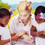 Madonna Instagram - It is indeed a Mad world that we live in. And where would we be without the innocence and imagination of our children to remind us that Magic is all around us and anything is possible! .Happy birthday to Estere and Stellla Mwale !! How could you be 11 years old already? Because you are The Most magical Twins in The World!! 👑👑 When I look at older videos of you Speaking Chichewa And having tea parties or dancing with a trance-like joy, I want to cry!! Time is a cruel mistress who leaves us with our memories never again to re -live them Only to try desperately to remember. I will never forget The first time we met you in Machinji. Your eyes held the whole world in them. The same way we now hold you locked inside of our hearts. In a way…. we are all displaced children , looking for connection. looking for love, ♥️. Looking for a home which is ultimately ourselves! Zikomo 🇲🇼 #garyjules