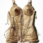 Madonna Instagram - Who doesn’t remember My iconic Gold corset designed by the one and only Jean Paul Gaultier for my Blonde Ambition tour in 1990?!   Now you can have an exclusive T-shirt created by the man who designed it, and the woman who wore it —M.E. 👑   All proceeds from this Special collaboration will benefit @RaisingMalawi and help provide critical medical interventions to orphans and vulnerable children at the Mercy James Center for Pediatric Surgery and Intensive Care.    Thanks to @RaisingMalawi and the support that the Mercy James Center has been able to provide for over 11,000 surgeries since it opened in 2017. 🇲🇼 Funds from these T-shirts will ensure that thousands more children will receive the surgical care they need to thrive and survive. 💙💙💙 @jeanpaulgaultier   SHOP link in Bio #jpgxmadonna