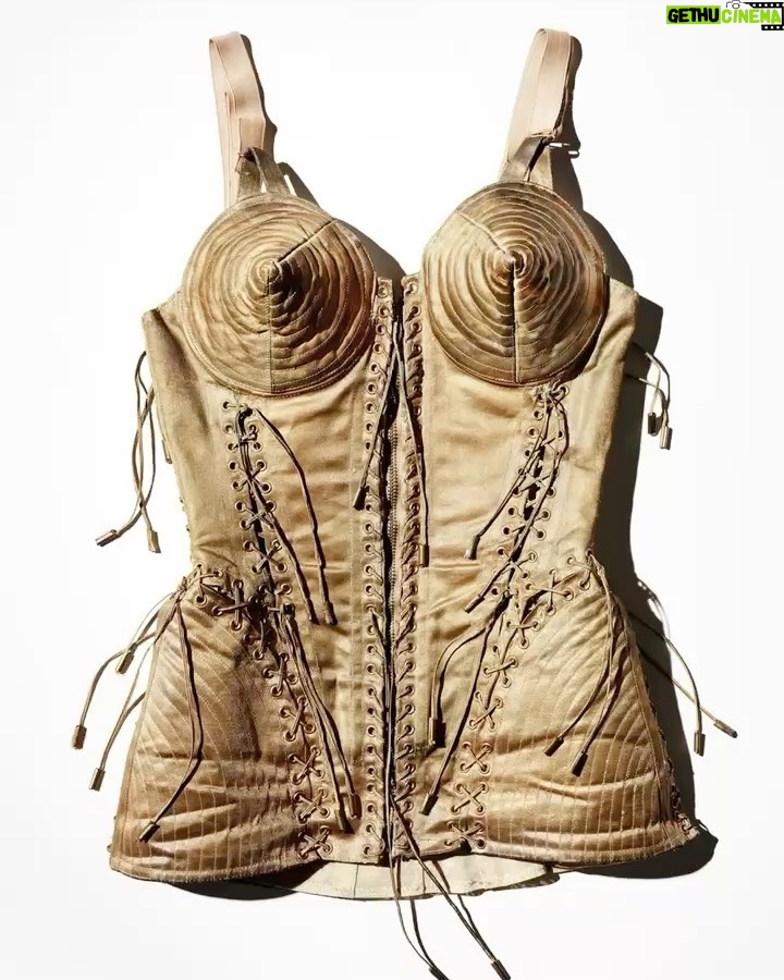 Madonna Instagram - Who doesn’t remember My iconic Gold corset designed by the one and only Jean Paul Gaultier for my Blonde Ambition tour in 1990?! Now you can have an exclusive T-shirt created by the man who designed it, and the woman who wore it —M.E. 👑 All proceeds from this Special collaboration will benefit @RaisingMalawi and help provide critical medical interventions to orphans and vulnerable children at the Mercy James Center for Pediatric Surgery and Intensive Care. Thanks to @RaisingMalawi and the support that the Mercy James Center has been able to provide for over 11,000 surgeries since it opened in 2017. 🇲🇼 Funds from these T-shirts will ensure that thousands more children will receive the surgical care they need to thrive and survive. 💙💙💙 @jeanpaulgaultier SHOP link in Bio #jpgxmadonna