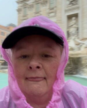 Magda Szubanski Instagram - #MagsTravelTips Compare the pair. I recommend seeing the #trevifountain during a thunderstorm in a flouro pink plastic poncho. You get the joint (almost) to yourself. Most tourists are pussies who don’t like to get wet. That said, it took 3 days for my runners to dry. And I did get a touch of foot rot. The other, sun shiny way is also good. But I couldn’t do the traditional “three coins in a fountain” coz, ya know, inflation #roma #travelblogger #FatLadyTravels ❤️🇮🇹🪙⛲️😘 
To those suggesting newspaper in my shoes …all very well…except newspapers don’t exist anymore. And you can’t dry your shoes with digital media. Tho there is a lot of hot air 💨 🔥