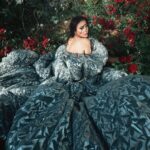 Maguy Bou Ghosn Instagram - A new era | 🪐✨ #MaguyBouGhosn | #ماغي_بو_غصن Styled by @styledbyibra Cape @tonywardcouture Earrings @yvantufenkjian Photographer @georgess_saliba Hair @michel_layoun Make up @patriciariga Location @woodhills.resort