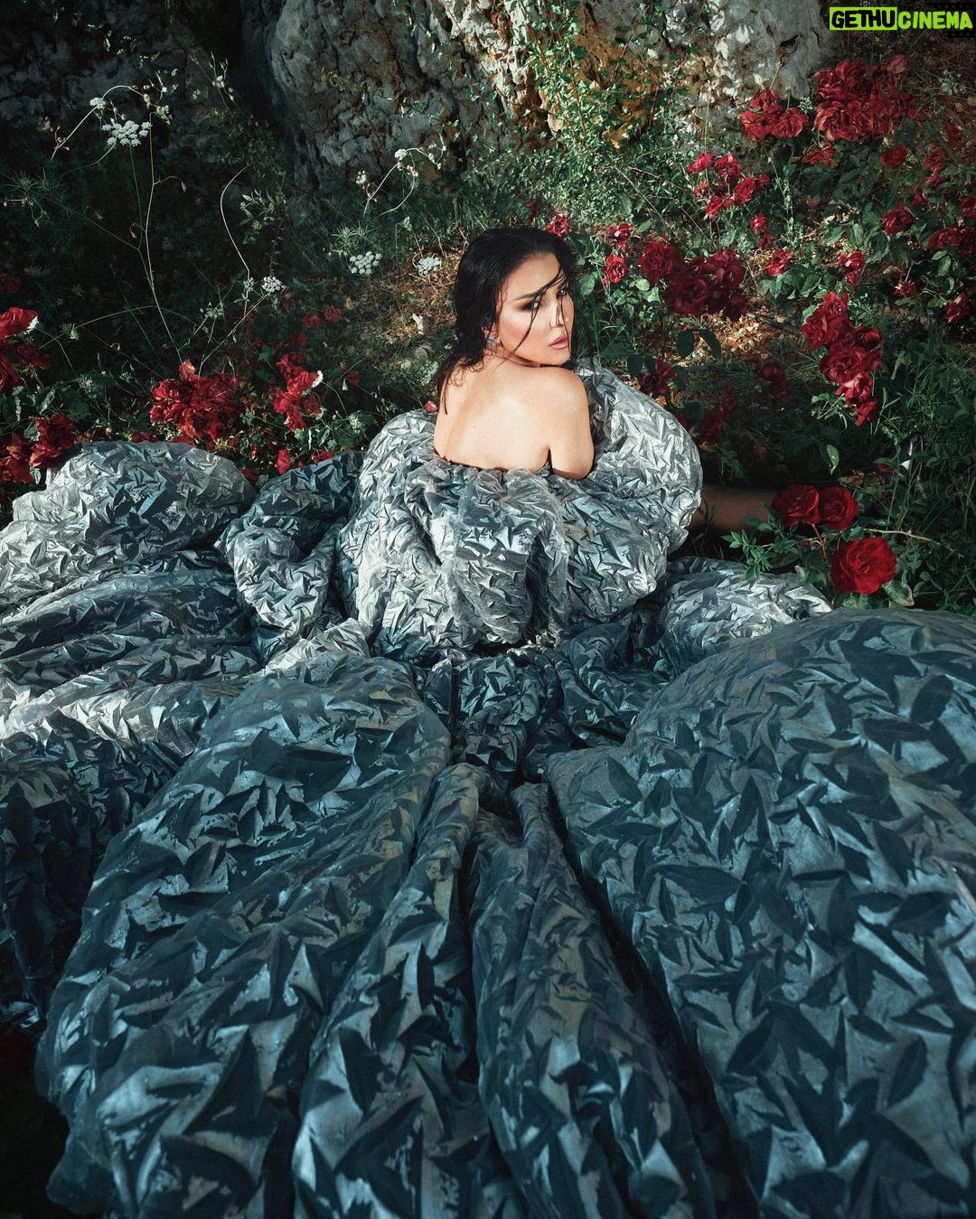 Maguy Bou Ghosn Instagram - A new era | 🪐✨ #MaguyBouGhosn | #ماغي_بو_غصن Styled by @styledbyibra Cape @tonywardcouture Earrings @yvantufenkjian Photographer @georgess_saliba Hair @michel_layoun Make up @patriciariga Location @woodhills.resort