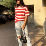 Mansi Taxak Instagram - Freedom to save & slay! 💯 Mad In India Sale with 40-80% OFF is now LIVE. 🚨 Add a pop of color and pattern to your look with this red and white striped t-shirt 💥 Website/ App Search: Women's White & Red Striped Oversized T-shirt Link in the bio 🔗 Shop Now 🛒 #womenfashion #stylegram #styleinspo #ootd #pinterestaesthetic #fashionista #BewakoofOfficial #OwnYourCrazy